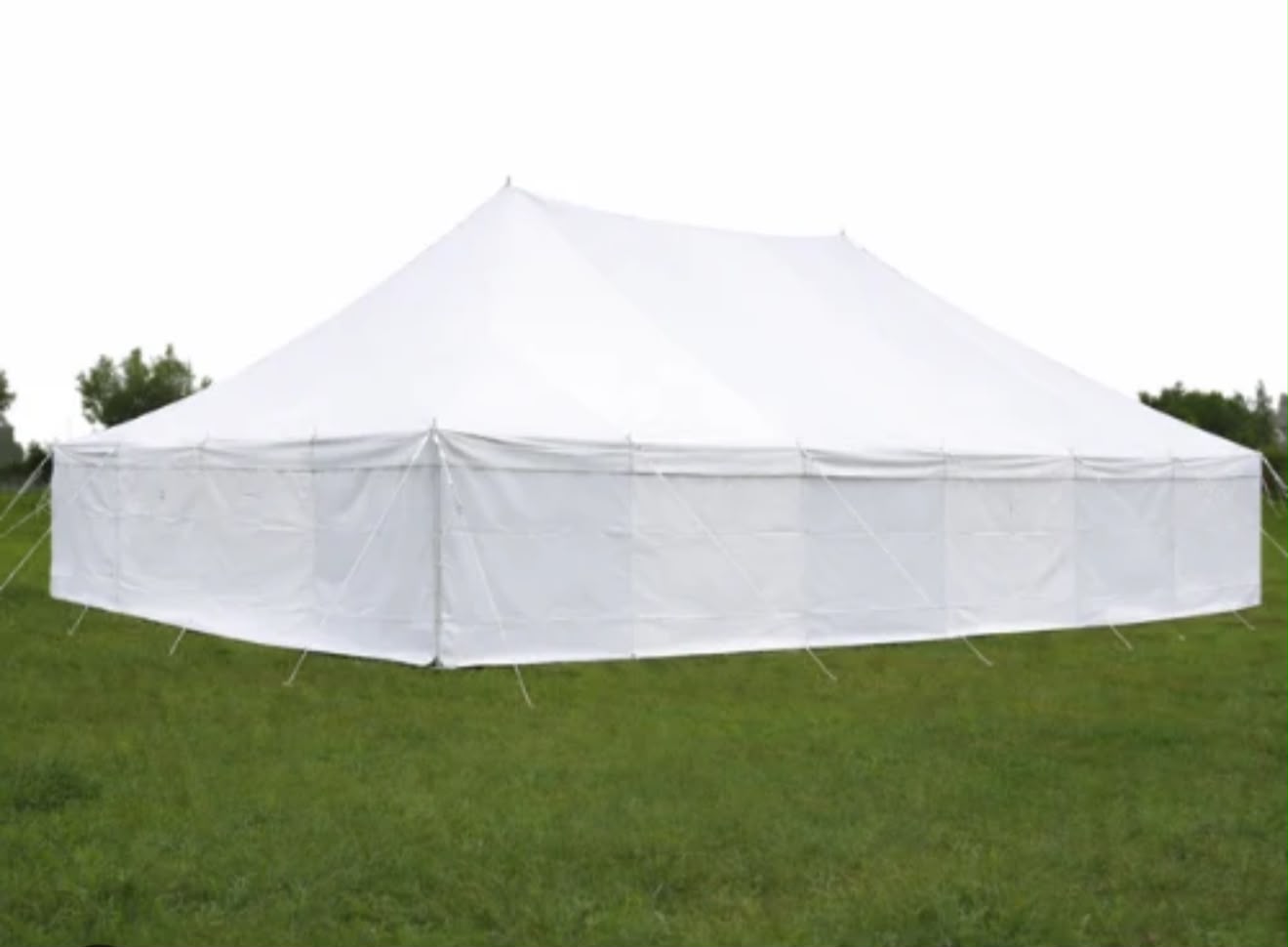 Normal Tents — classic white peg-and-pole tent on grass